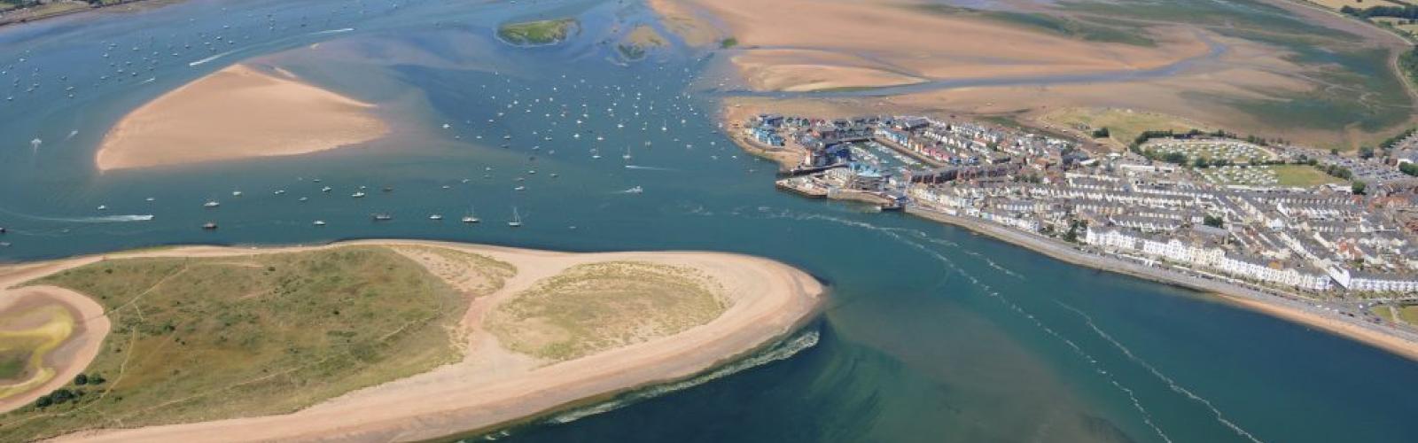 An aerial photograph of the Exe Estuary (c) Still Imaging