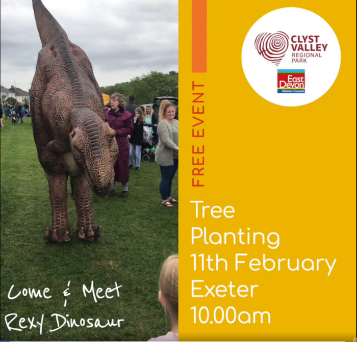 A child meeting Rexy the dinosaur 