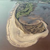 An aerial photograph of Dawlish Warren with Warren Point in the foreground