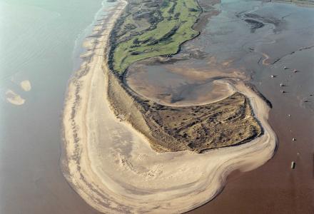 An aerial photograph of Dawlish Warren with Warren Point in the foreground